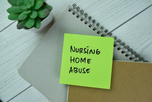post it with 'nursing home abuse' written on it