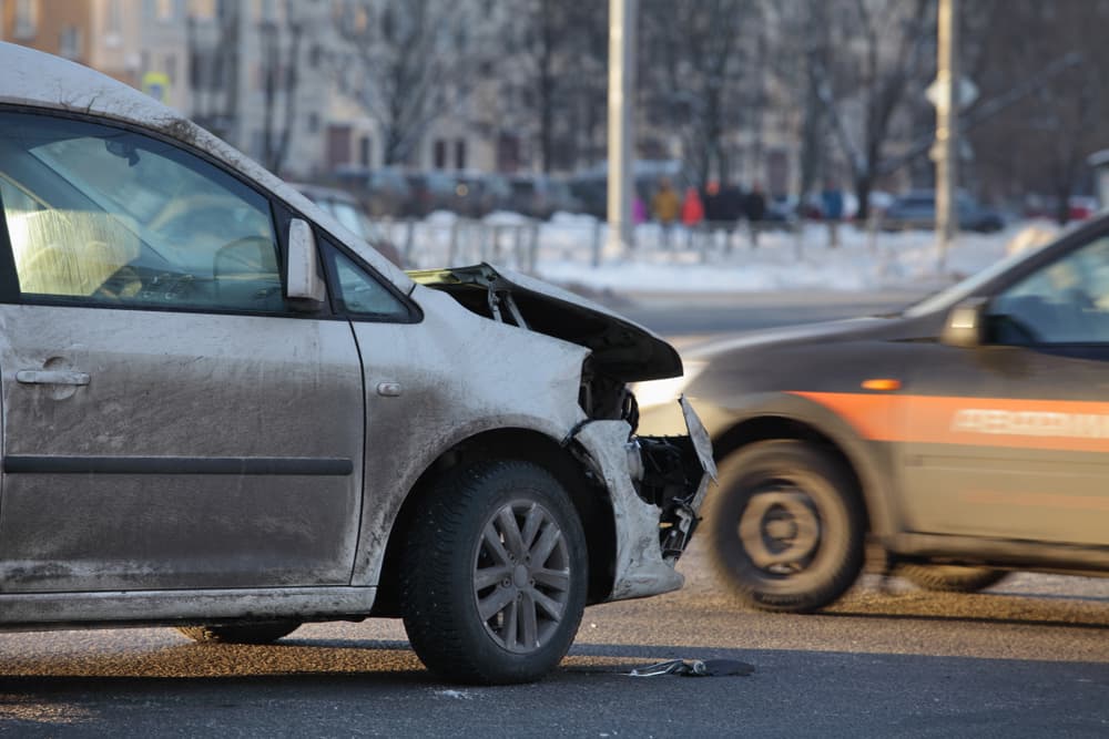 Head-on collision accident of cars at the intersection